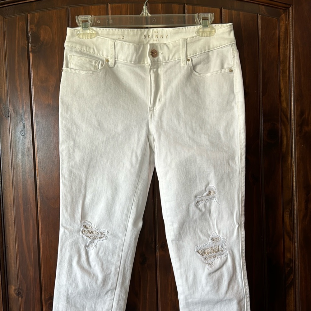 White skinny jeans with lace distressed detail size 2